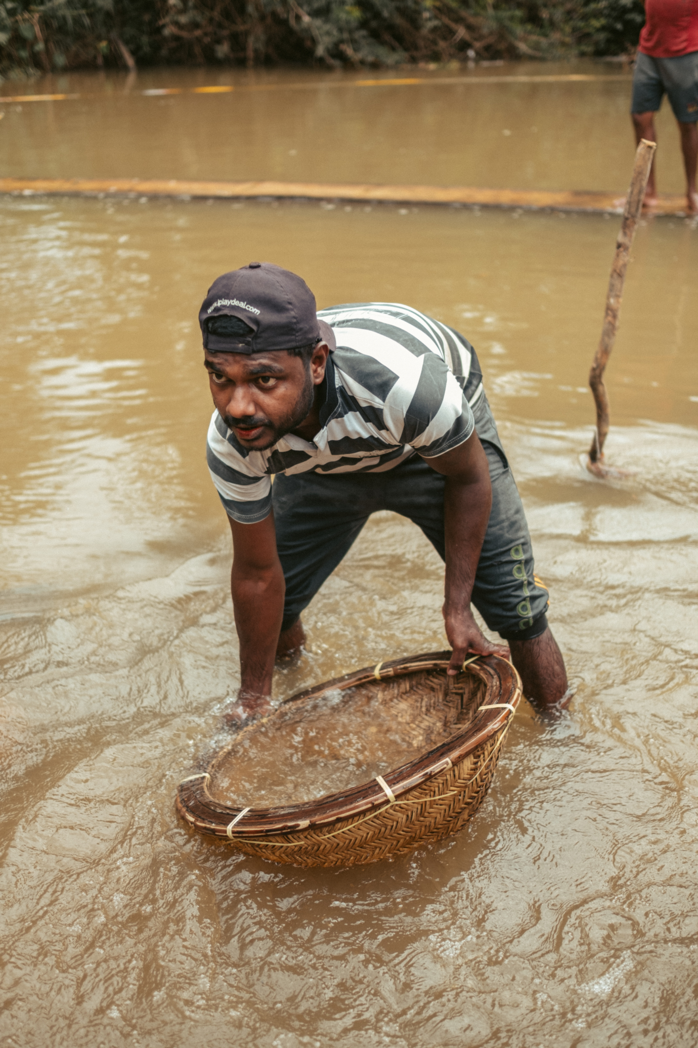 Washing gemstone gravel in the river