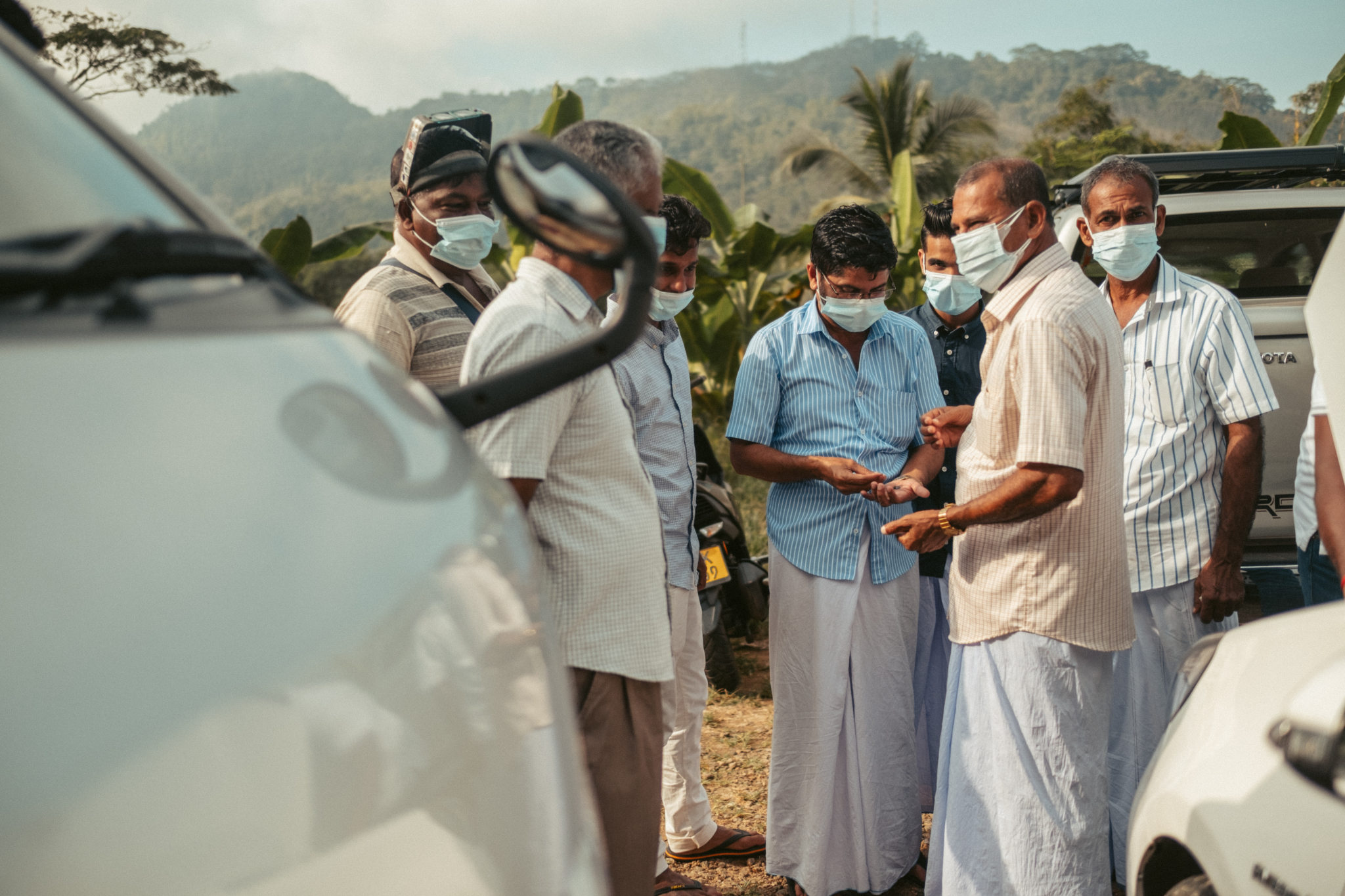 Traders gather at the rough gem market just after dawn