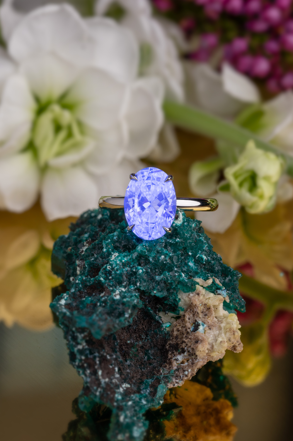 An ultraviolet light is shone on this 3.0ct solitaire diamond engagement ring to highlight the stones fluorescent characteristics and properties