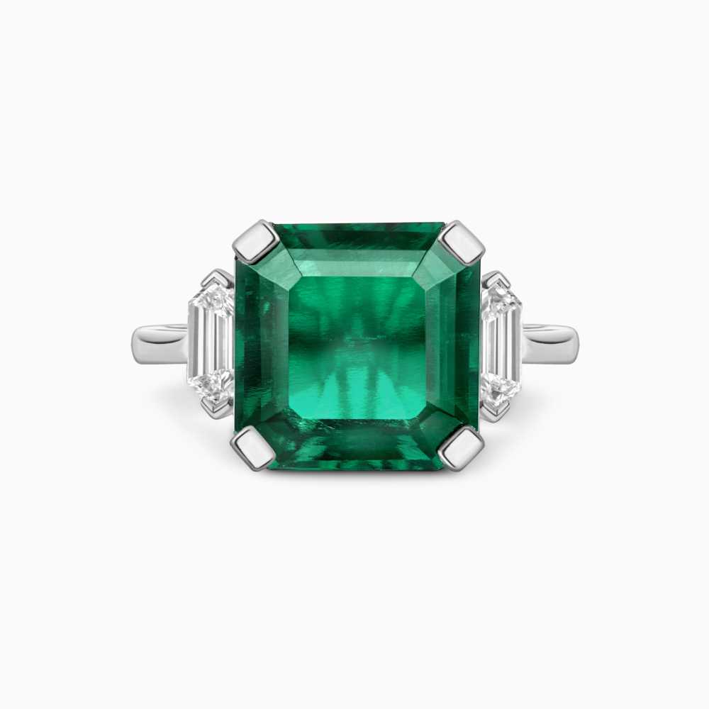 Emerald and bullet cut diamond art deco ring Front