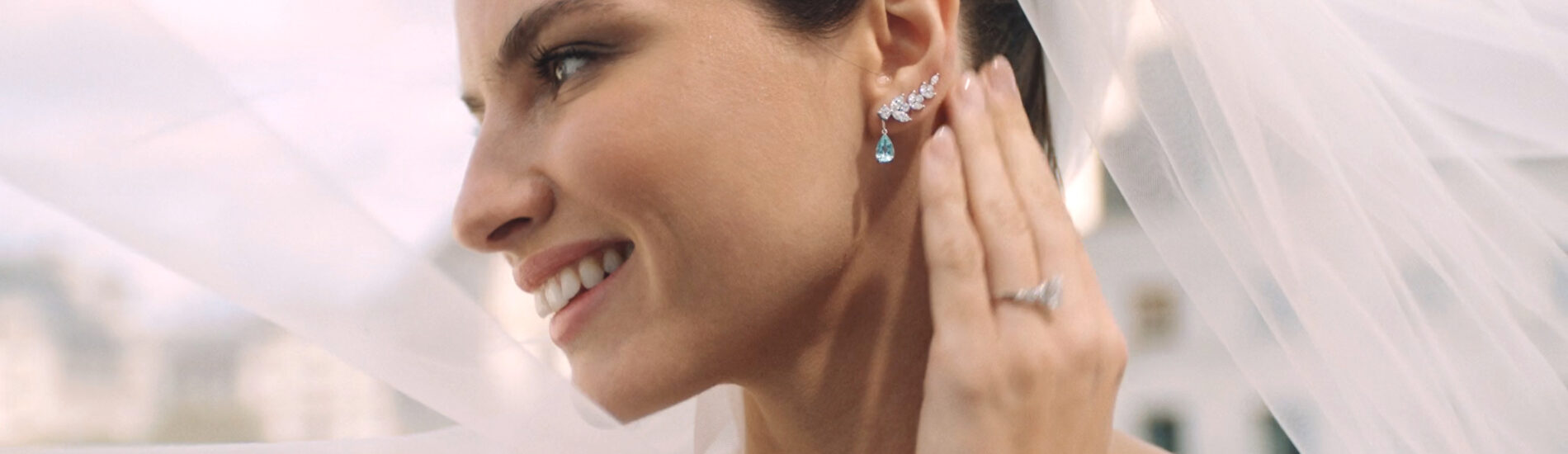 Blackacre diamond ear climbers with a Paraiba Tourmaline droplet