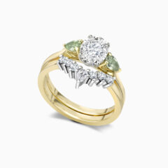 Curved diamond wedding ring with oval engagement ring - Perspective - Website