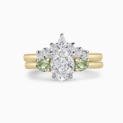 Curved diamond wedding ring with oval engagement ring - Front - Website