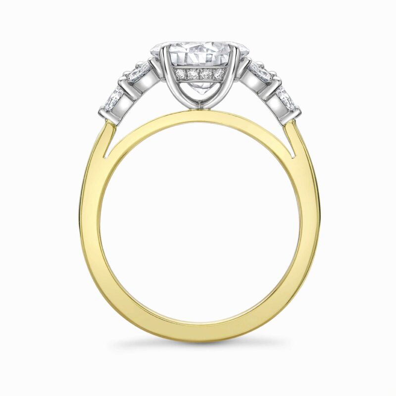 Diamond cluster ring through finger