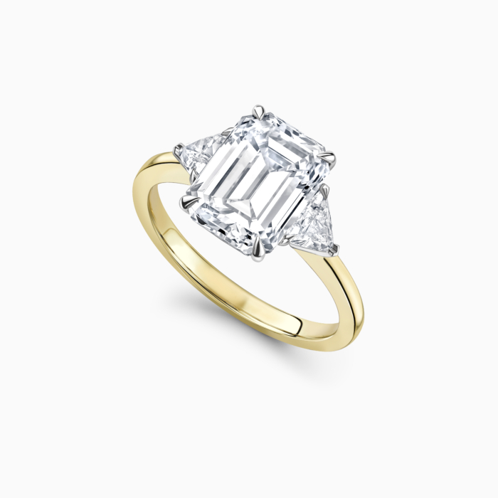 Emerald cut engagement ring cheap with trillion side stones
