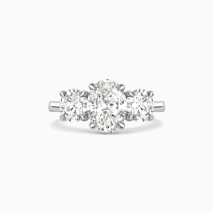 Oval diamond with sales round side stones
