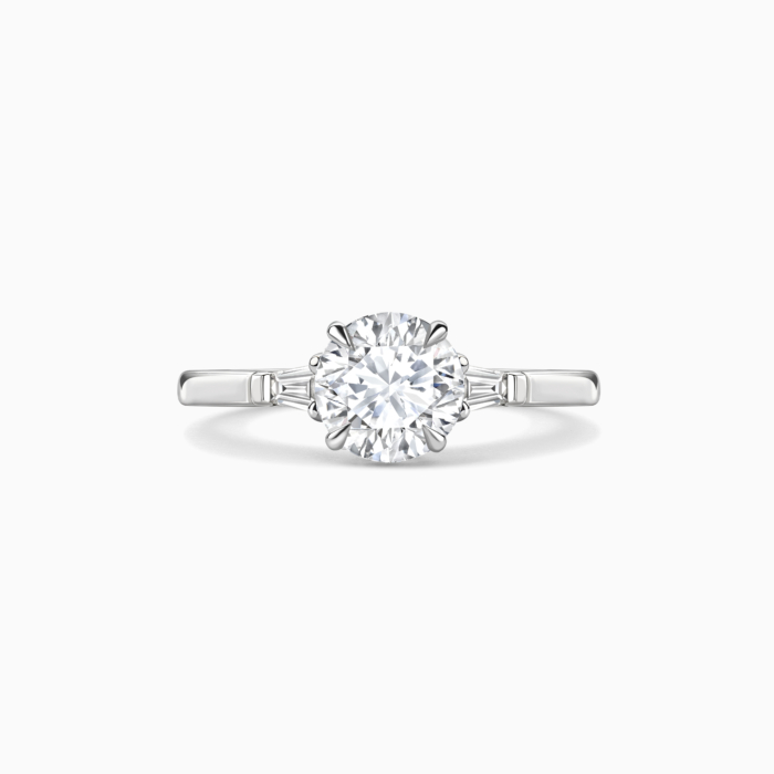 Solitaire with top tapered baguettes